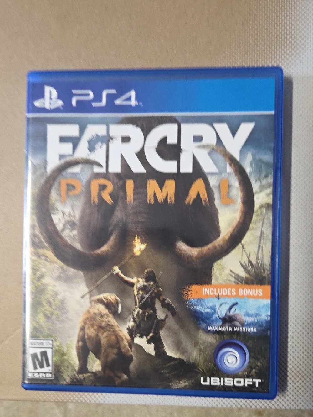Far Cry Primal (PS4) by Ubisoft - Blue Case. (PREOWNED)